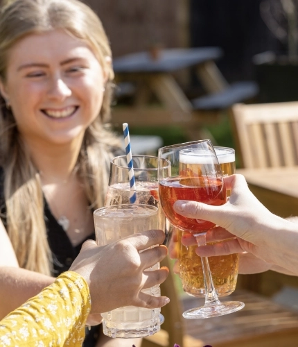 Guests enjoying summer drinks in the beer garden