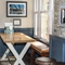 Interior dining area of a pub with a TV.