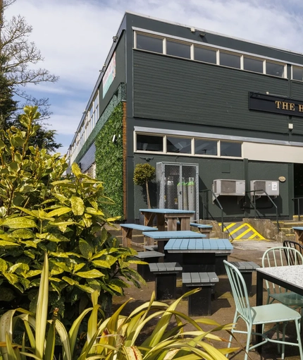 Exterior shot of the pubs facade and beer garden