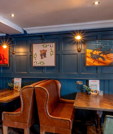 Comfy seating area within the restaurant at the George Abbot.