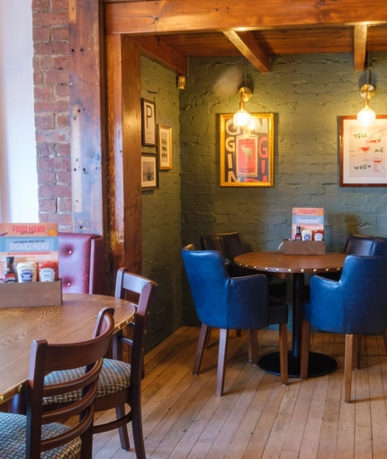 An image of the interior restaurant seating area at The Guild.