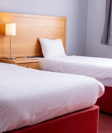 The interior hotel bedroom at the Kingstown Hotel.