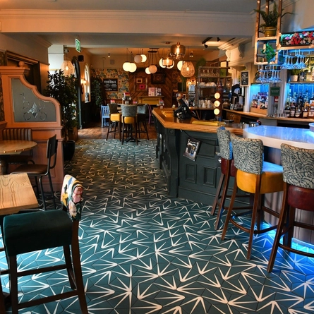 interior seating area and bar of the pub