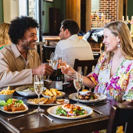 A couple enjoying a meal together in our restaurant