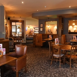 The interior restaurant seating area at The Merlin.
