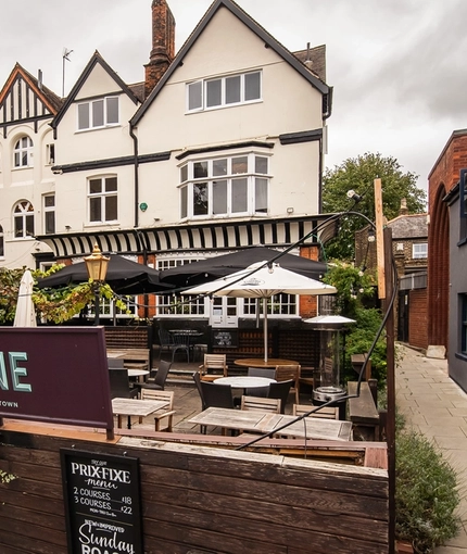 The exterior beer garden seating area with venue in the background at The Vine.