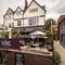 The exterior beer garden seating area with venue in the background at The Vine.
