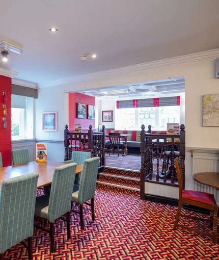 Interior dining area of a pub.