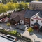 An aerial view image of the venue and surround area with outdoor seating and car park at The Castle View.