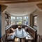 Interior seating area with one large table in a window