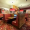 interior dining area of  a pub with a TV