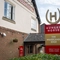 The exterior signage for The Woodlands.