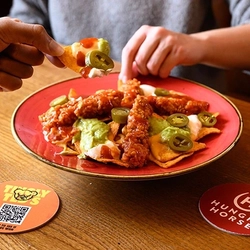 A served portion of chicken nachos with Tingly Teds sauce at hungry Horse venues.