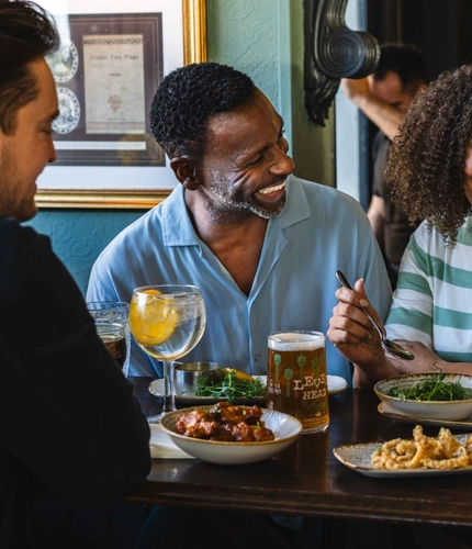 People enjoying a meal in a restaurant