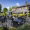 The exterior beer garden seating area with the venue in the background at The Crown & Horseshoes.