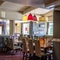 Interior dining area of a pub.