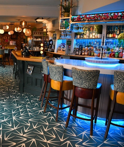 interior seating area and bar of the pub