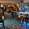 interior seating area and bar of the pub