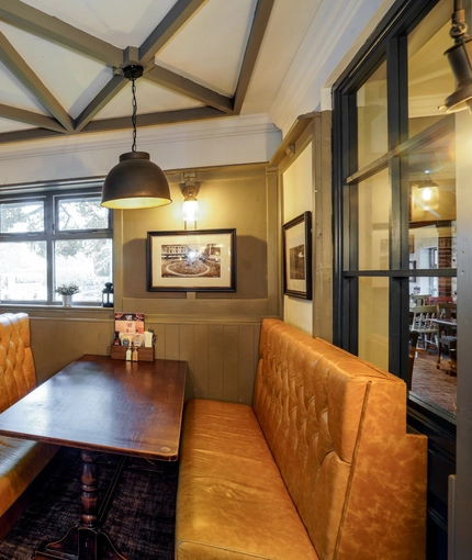 Interior dining area of a pub.