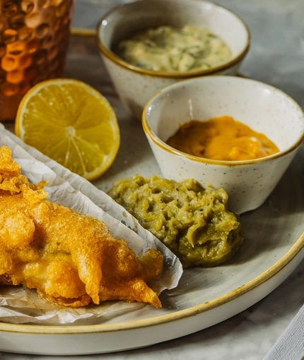 A fish & chips dish served at Crafted Venues.