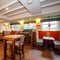 Interior dining area of a pub.