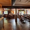 Indoor seating area in a bar, flags as decoration