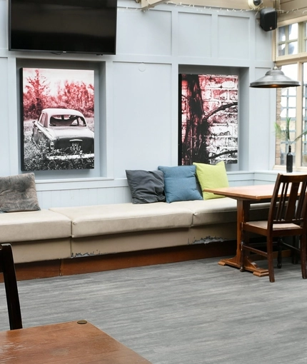 The interior conservatory restaurant seating area at The Duke Of Cambridge.