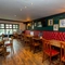Internal seating area in a pub restaurant