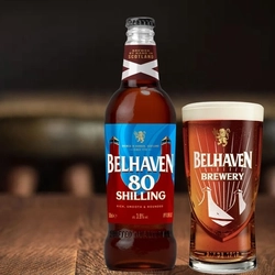 A bottle of Belhaven 80 shilling and a pint of Belhaven 80 shilling.