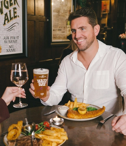 Couples enjoying a valentines meal at a Greene King Heritage vanue.
