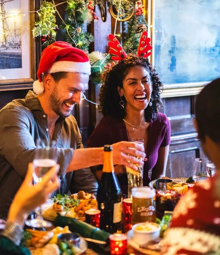 Friends enjoying a festive meal together