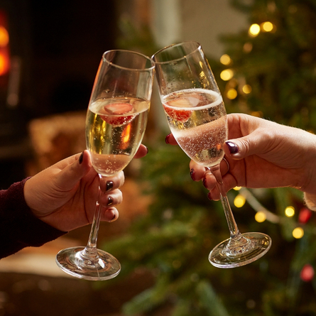 A 1200x800 Boxing Day Drinks Advertising Image showing two glasses of sparkling white wine available at Chef & Brewer Venues.