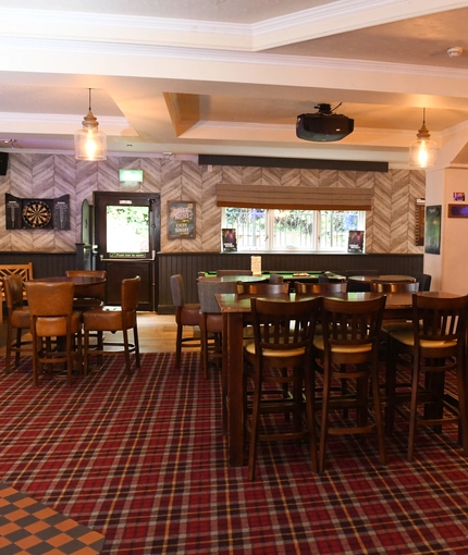 interior restaurant and seating area with pub games