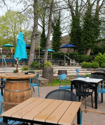 An exterior shot of the beer garden & seating area at the Sitwell Arms in Whiston.