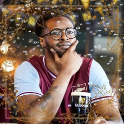 A man in a football shirt in the pub