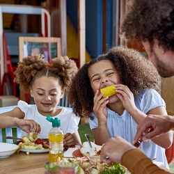 A Family enjoying a meal at Farmhouse Kitchen.