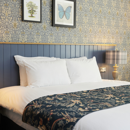 A bedroom at The Rose Revived hotel