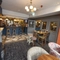 Interior dining area and pub area of a pub with a TV.