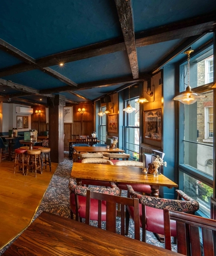 The interior restaurant and seating area at the Three Jolly Butchers.