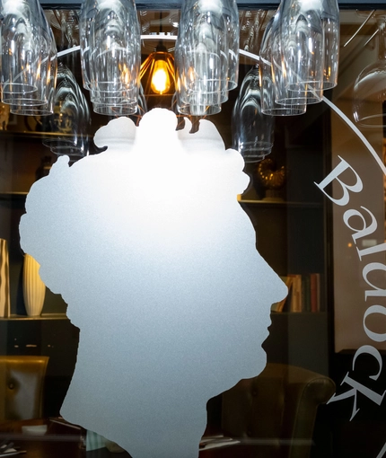 An etched mirror behind the bar