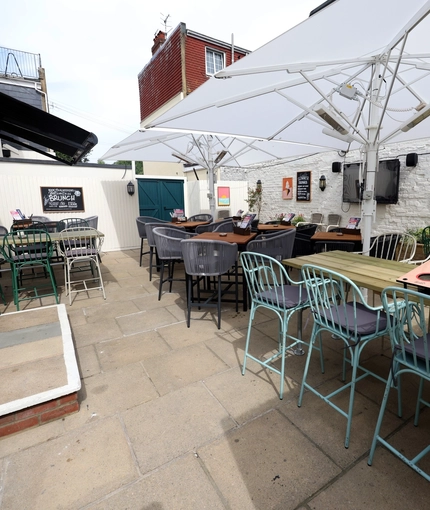 An exterior shot of the beer garden area at The Palmeira in Hove.