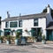 The exterior facade and beer garden seating area at The Yorkshire Grey.