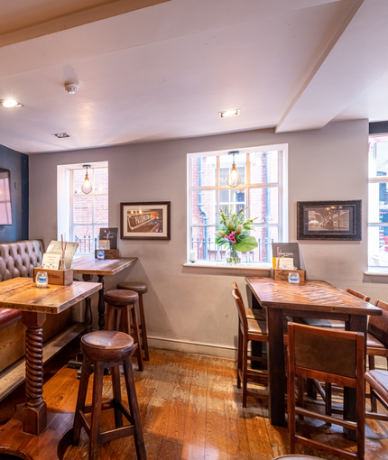 interior of the restaurant with a seating area