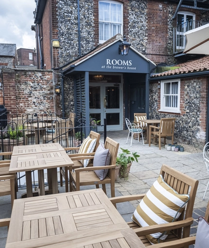 Some tables in the beer garden of the Rothley Court Hotel.
