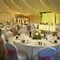 A marquee, decorated for a wedding.