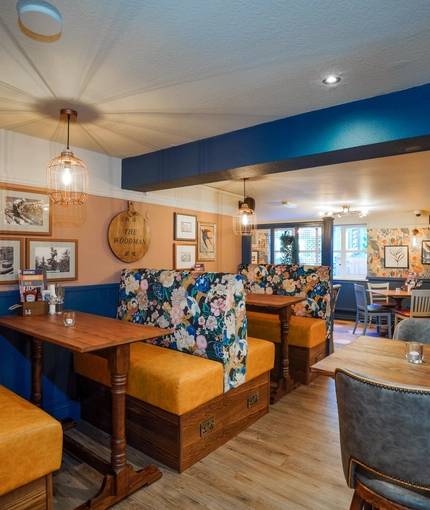 The restaurant area of the Woodman Inn.