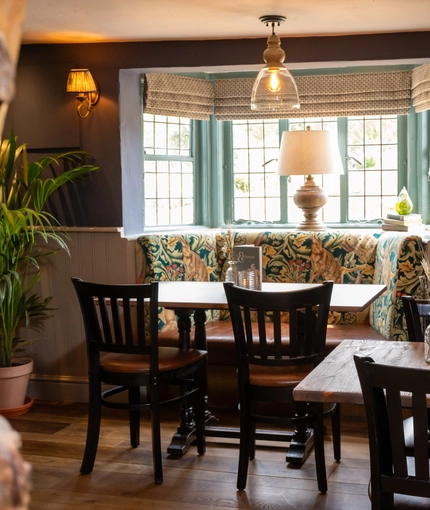 The interior restaurant and seating area at the Crown Inn.