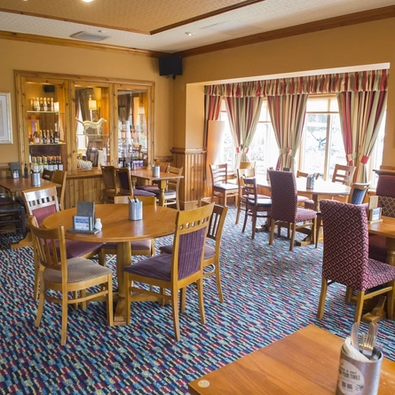 Interior dining area of a pub.