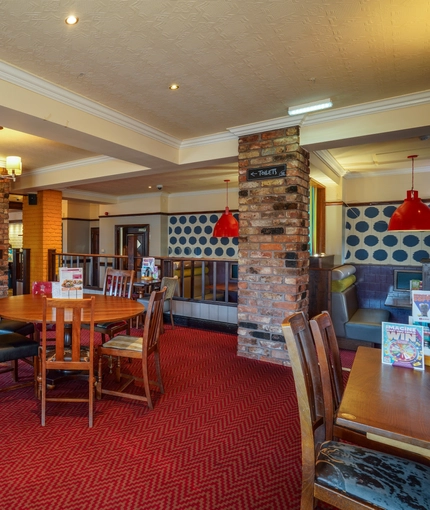 Interior dining area of a pub.