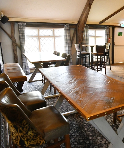 interior restaurant and seating area with pub games